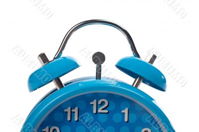 Partial view of blue alarm clock
