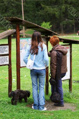 Tourist in front of National Park Board