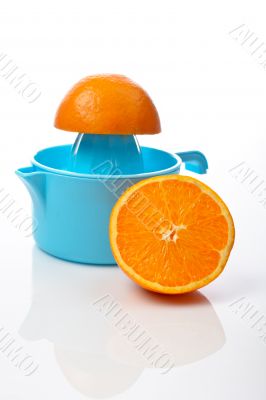 Squeezer and two half orange