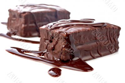 Two chocolate cakes with syrup