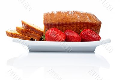 Slices of cake with three strawberries