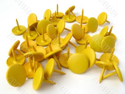 Yellow thumbtacks
