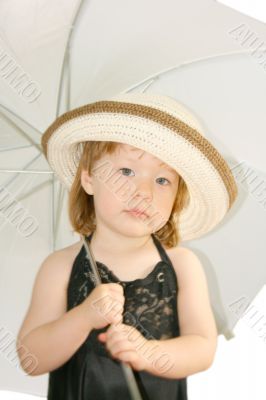 Small girl with umbrella