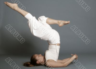 woman makes yoga
