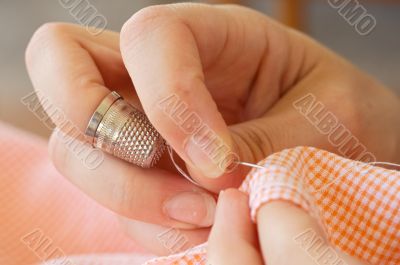 hands sewing