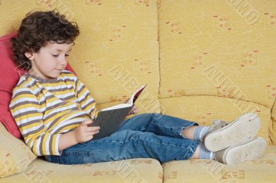 adorable boy reading