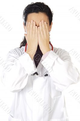 Doctor with the hands in the face