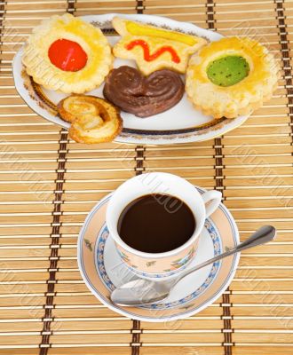 Cup of coffee with cakes