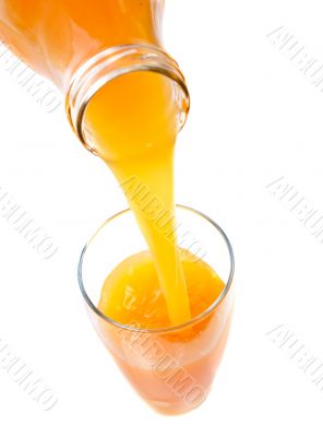 Pouring fresh orange juice
