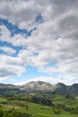 Landscape with cloudy sky