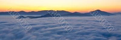 Spring sunrise over the fog