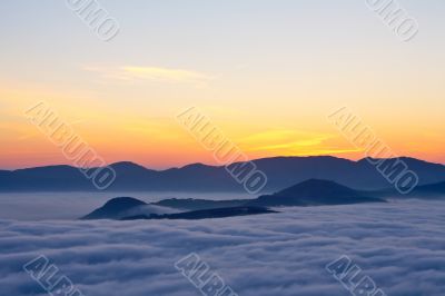 Spring sunrise over the fog