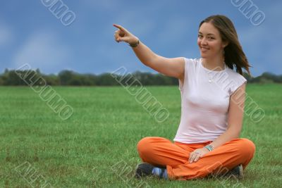 casual girl pointing towards screen - sally