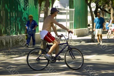 Man walking with his bicycle