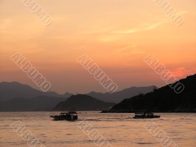 ships in sunset