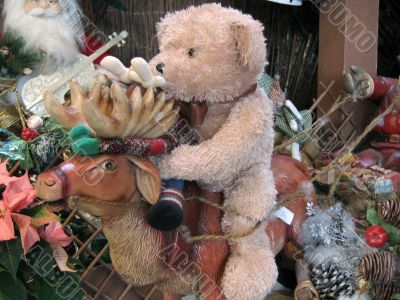 Bear on reindeer