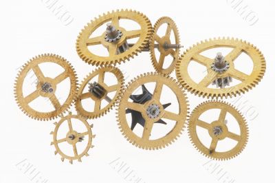 eight old gold-coloured little cogwheels