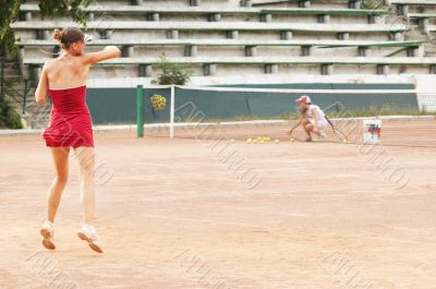 blond girl playing tennis