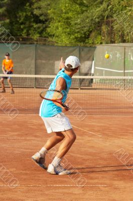 boys playing tennis