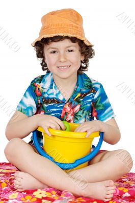 adorable boy playing in the beach