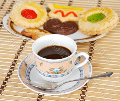 Cup of coffee with cakes