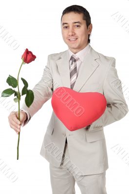 Attractive young man giving a love gift