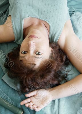 Beautiful woman lying upside down