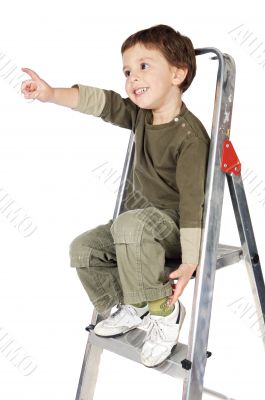 adorable boy ndicating the sky