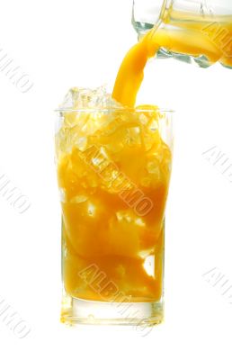 pouring fresh orange juice
