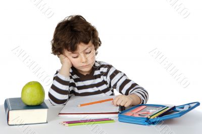 Adorable boy studying