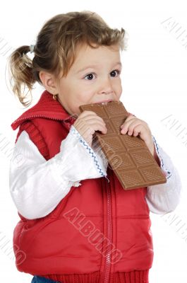adorable girl eating chocolate