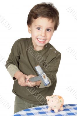 adorable boy breaking the money box