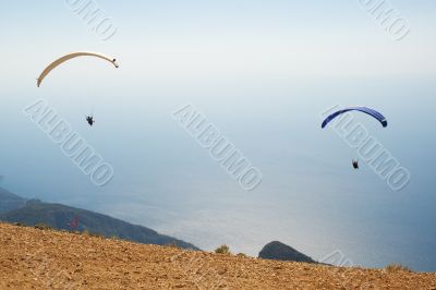 Two parachutes in the sky