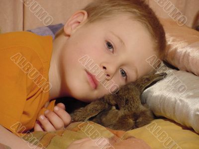 child with rabbit