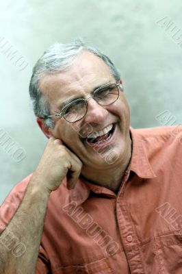 Mature man laughing