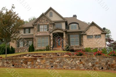 House over Stone Wall