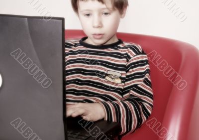 child with laptop