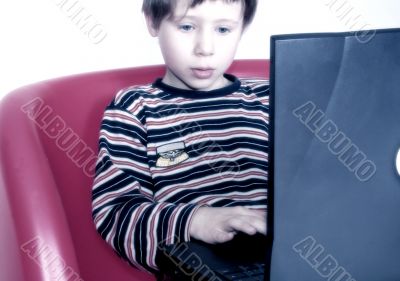 child with laptop
