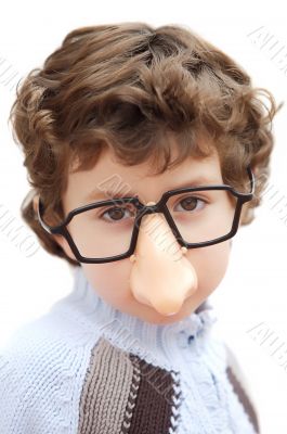 adorable boy with glasses and nose of toy