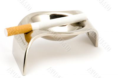 ash-tray with cigarette