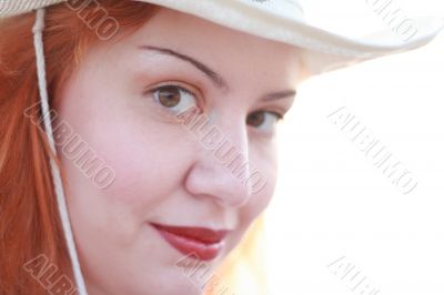 Woman in white hat