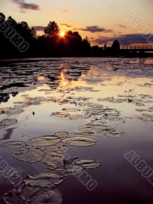sunset above the silent river