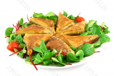 samosas on a plate