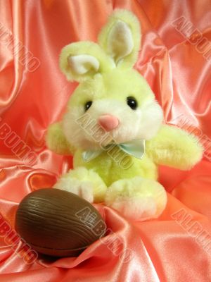 Easter bunny with chocolate egg