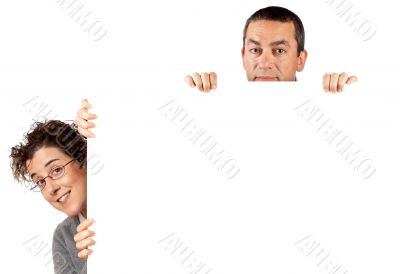 Behind the blank poster