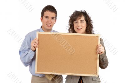 Holding the empty corkboard