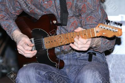 Playing guitar