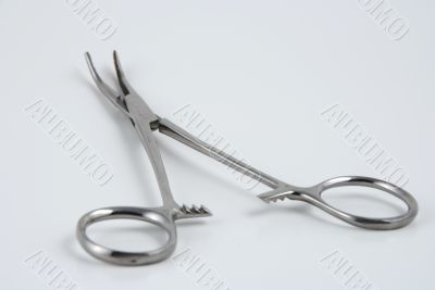Hemostats and clamps