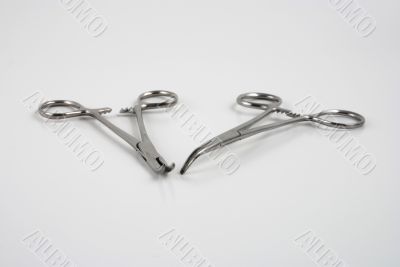 Hemostats and clamps