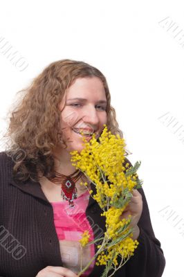 Woman with wattle flowers